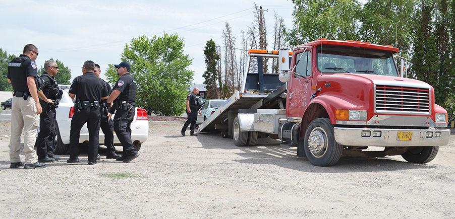 One car gets towed away